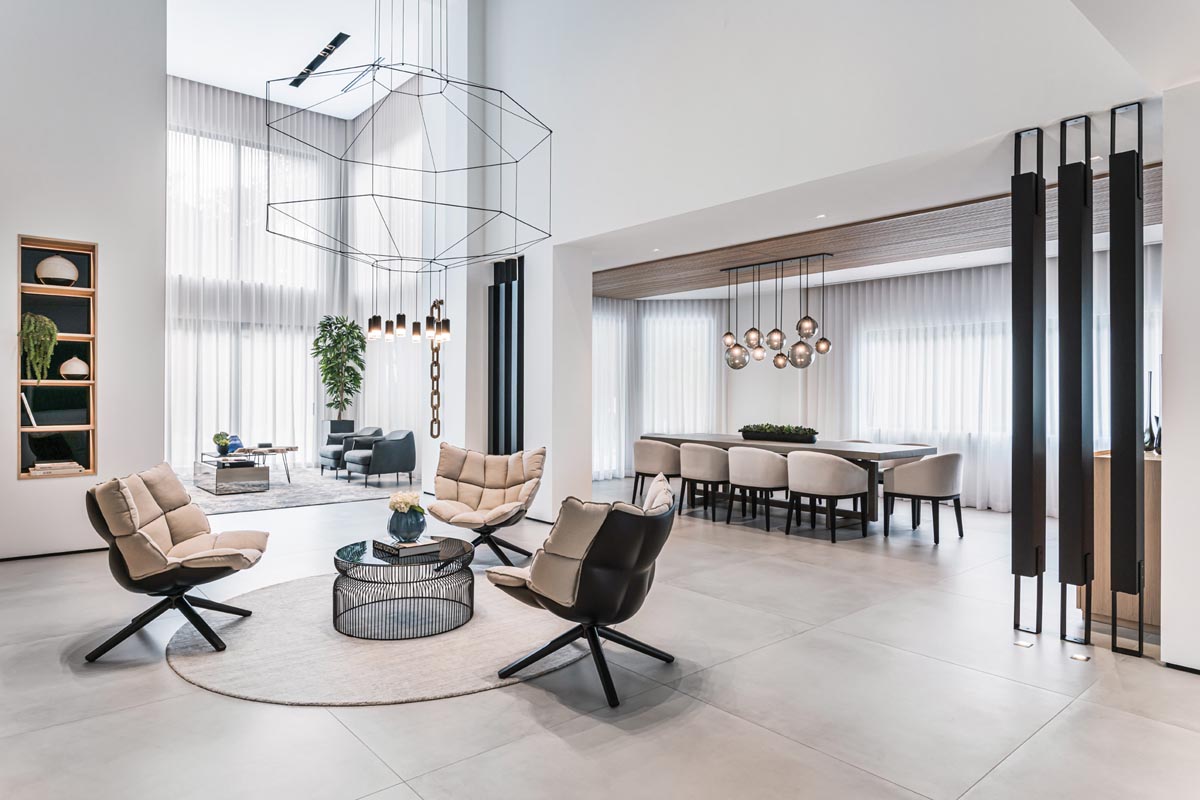 A giant Wireflow chandelier commands the circular entry foyer of the residence, just as designers Rafaela Simoes and Laila Colvin intended. Mixing soft and rigid materials with cool and warm textiles was key to satisfying the homeowners’ contrasting visions and tastes.