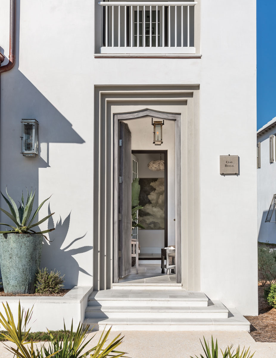 Without many frills but a large planter with succulents, the home’s façade reflects the ornamentation-free architecture of Alys Beach.