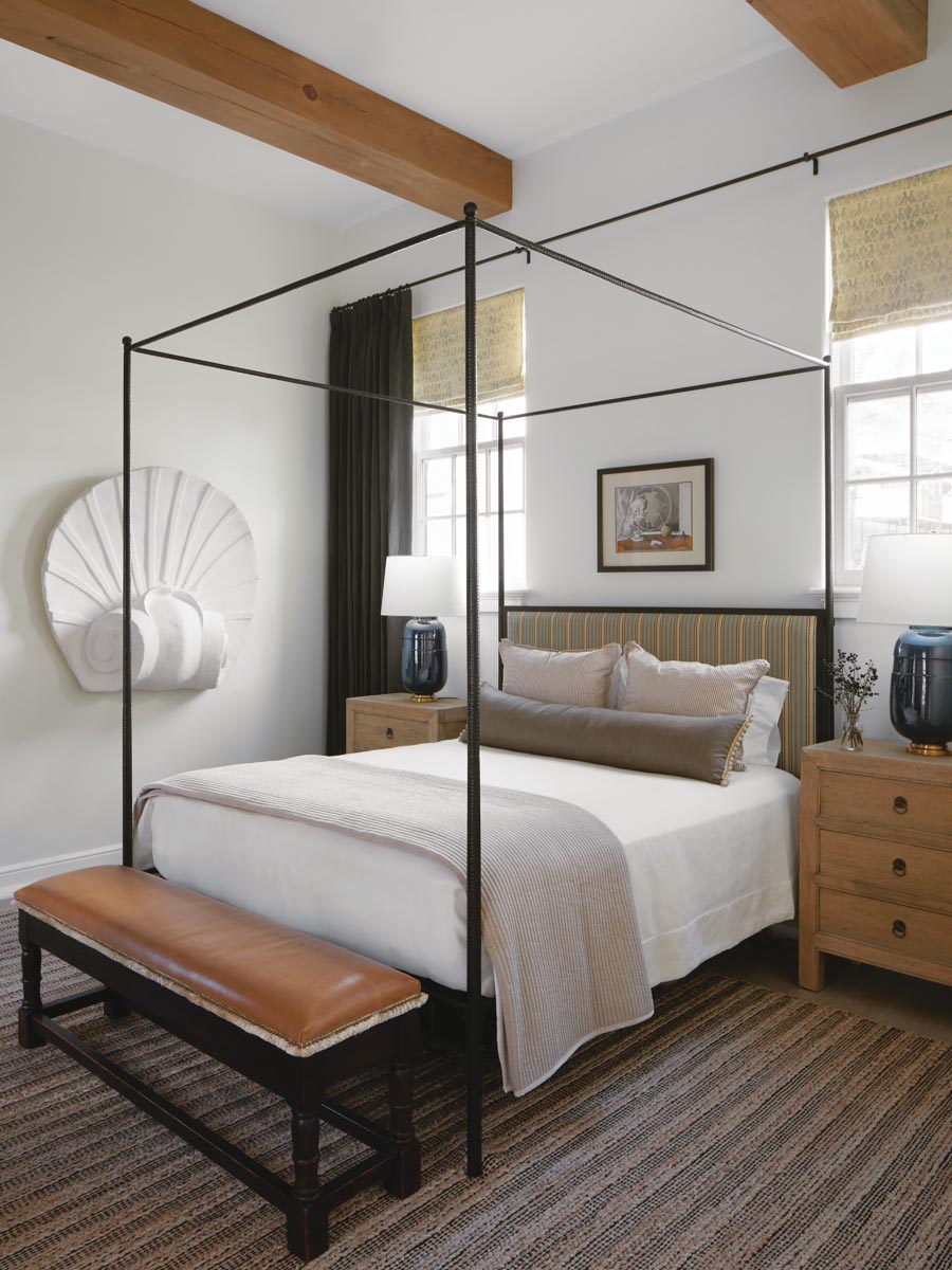An elegant poster bed from Bungalow Classic paired with antique Club Cu side tables and Christopher Spitzmiller lamps lend an air of refinement to the guest bedroom. The fluid curves of an antique shell relief salvaged from an Art Deco Miami hotel gracefully counterbalance the bed’s delicate linear form.