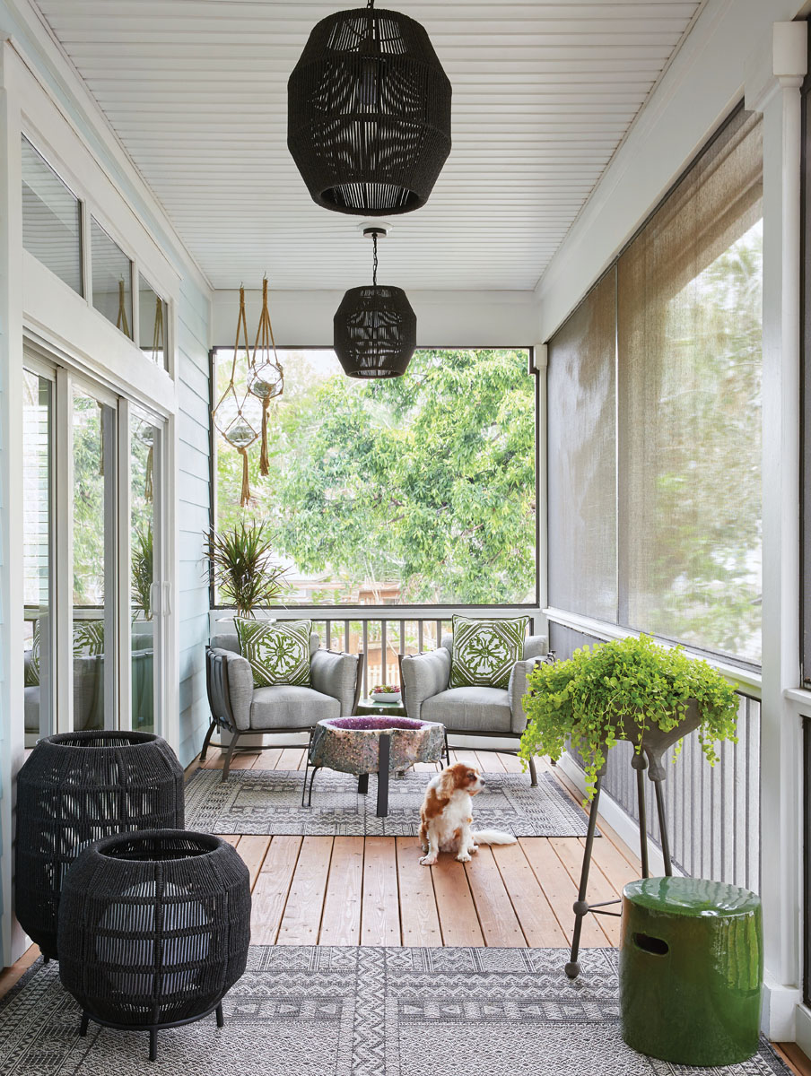 Robyn Branch_FD31-2G Photography by Zeke Ruelas Photography, Nashville, TN To create an outdoor oasis, Branch hung macramé globes, added greenery filled planters, and placed ultra- comfortable furniture on which the homeowner could relax—plus an amethyst geode coffee table for some earthy sparkle.